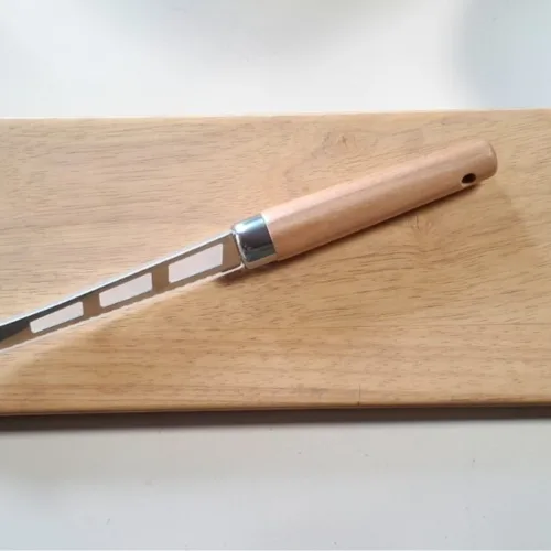 the paddle ( cheese board